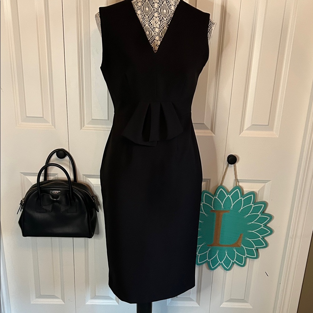 Elegant Black Sleeveless Dress by Italian Designer Rinascimento.